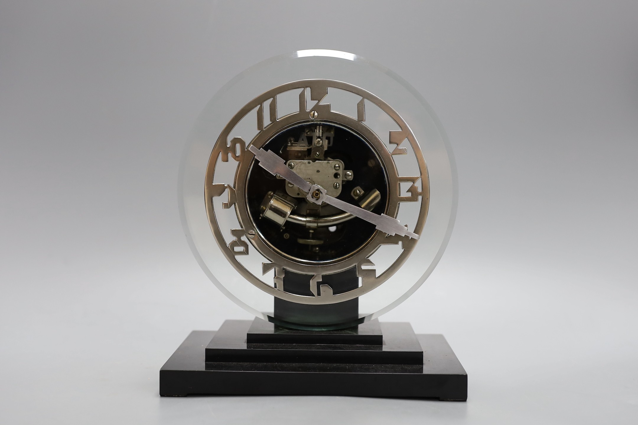 An Ato Art Deco electric mantel timepiece, 22cms high, 19cm wide 22cm high